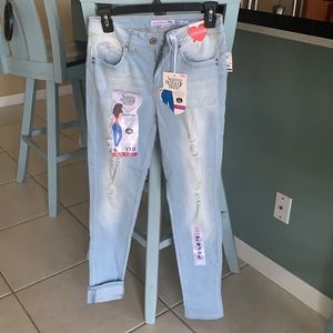 Juniors mid rise skinny jeans